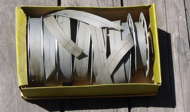 /images/waits/words-on-paper-tape.png